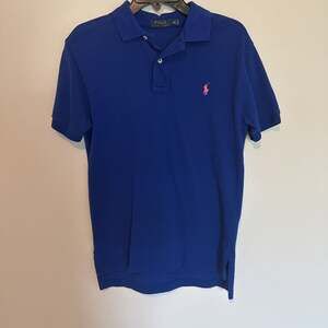 Polo Ralph Lauren Men's Blue Short Sleeve Polo Shirt with Orange Pony Logo